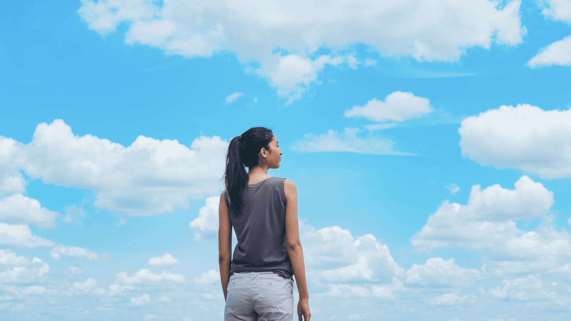 woman and clouds